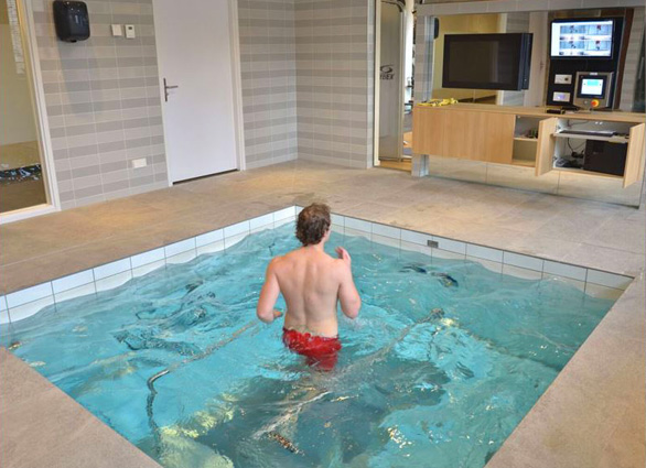 Movable floor pool treadmill